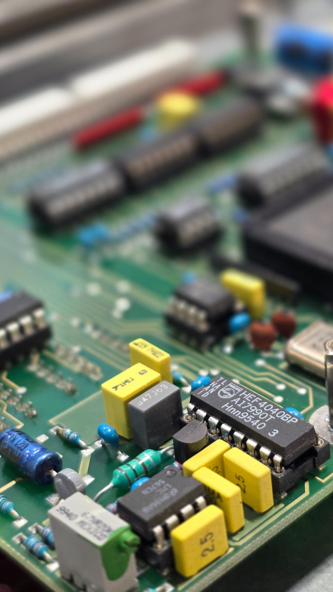 LJU Automation electronic circuit board featuring integrated circuits, controller capacitors, resistors, and connectors mounted on a green PCB.